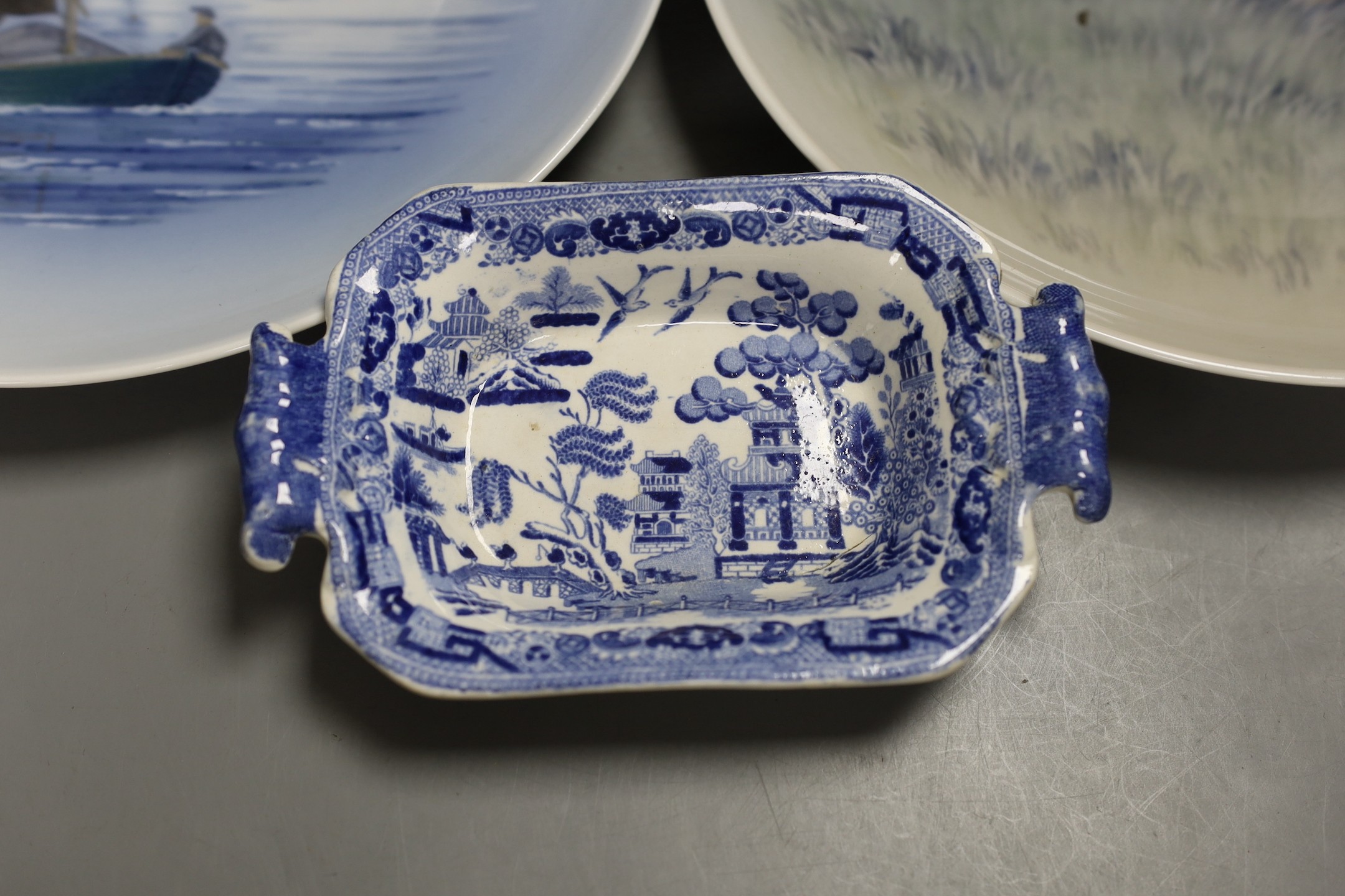 A pair of Royal Copenhagen plates, a pair of German pottery ewers a blue and white dish and pickle dish, plates 25 cms diameter.